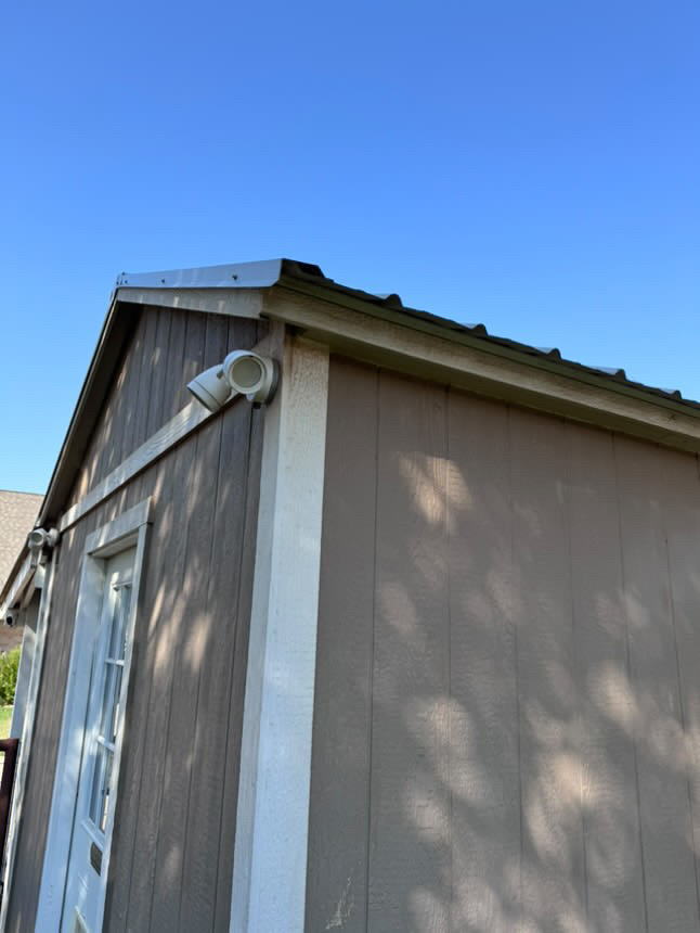 Pressure washing roof